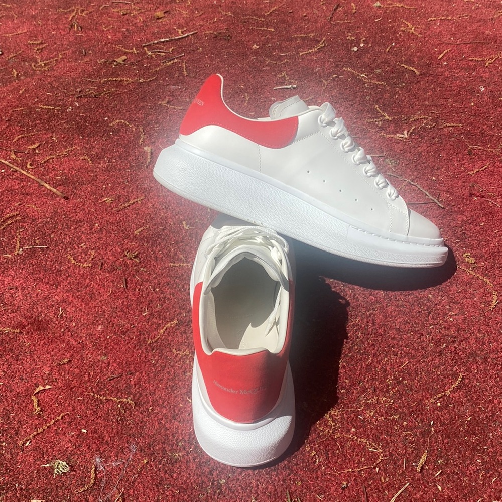 Only worn once , white with red color ,